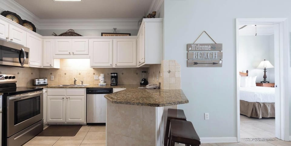Condo, 2 Bedrooms | Private kitchen | Coffee/tea maker, fridge, oven