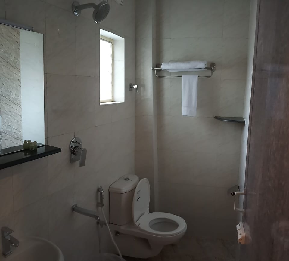 Shower, towels, soap, shampoo
