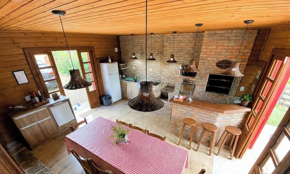 Family Cabin, 1 Bedroom, Fireplace, Lagoon View | Private kitchen | Fridge, microwave, cookware/dishes/utensils, dining table