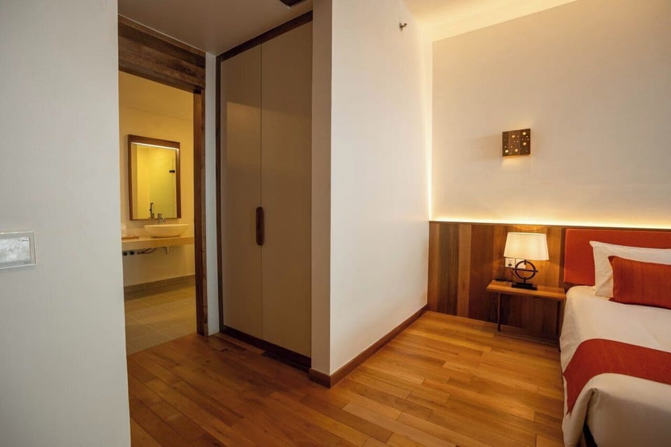 Suite, City View | Desk, laptop workspace, WiFi (free), bed sheets