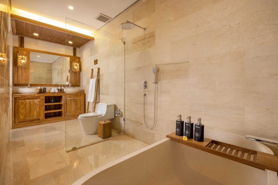 Suite, 1 King Bed, Pool Access, Garden View | Bathroom | Separate tub and shower, hair dryer, slippers, towels