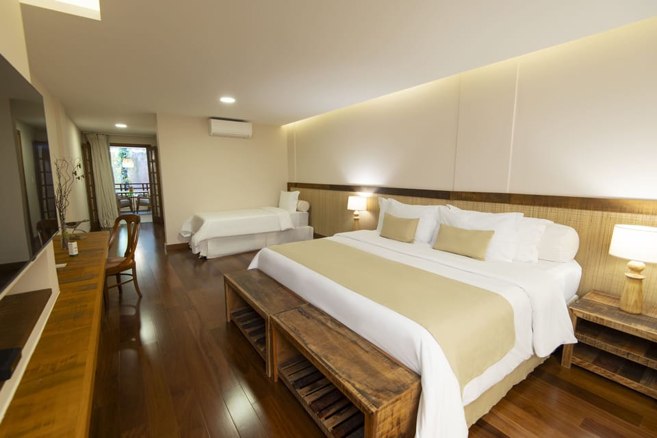 Premium Room, 1 King Bed, Lanai, Garden View | Minibar, in-room safe, free WiFi, bed sheets