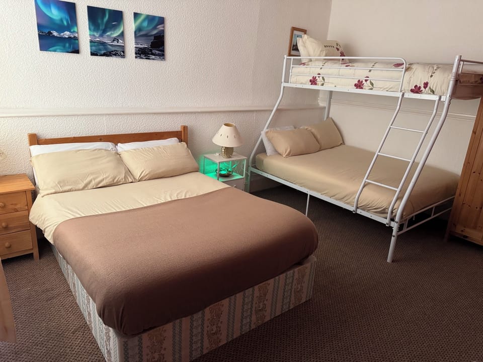 Family Room, Multiple Beds, Non Smoking | Iron/ironing board (on request), WiFi (free)