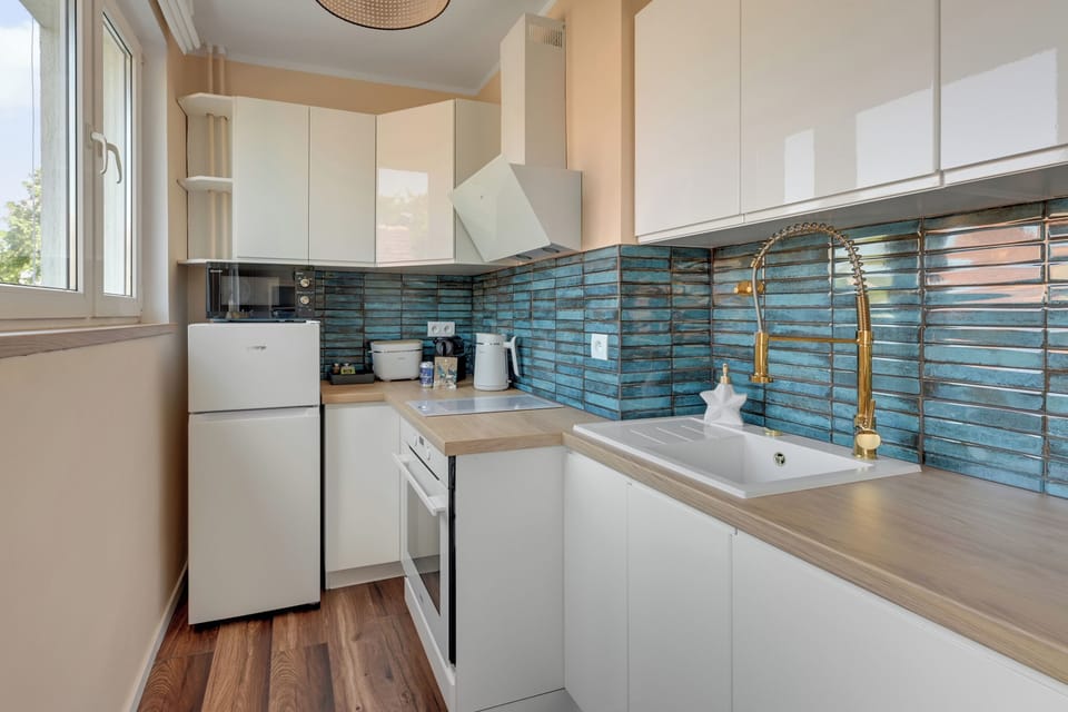 Comfort Apartment | Private kitchenette | Coffee/tea maker, electric kettle, toaster, highchair