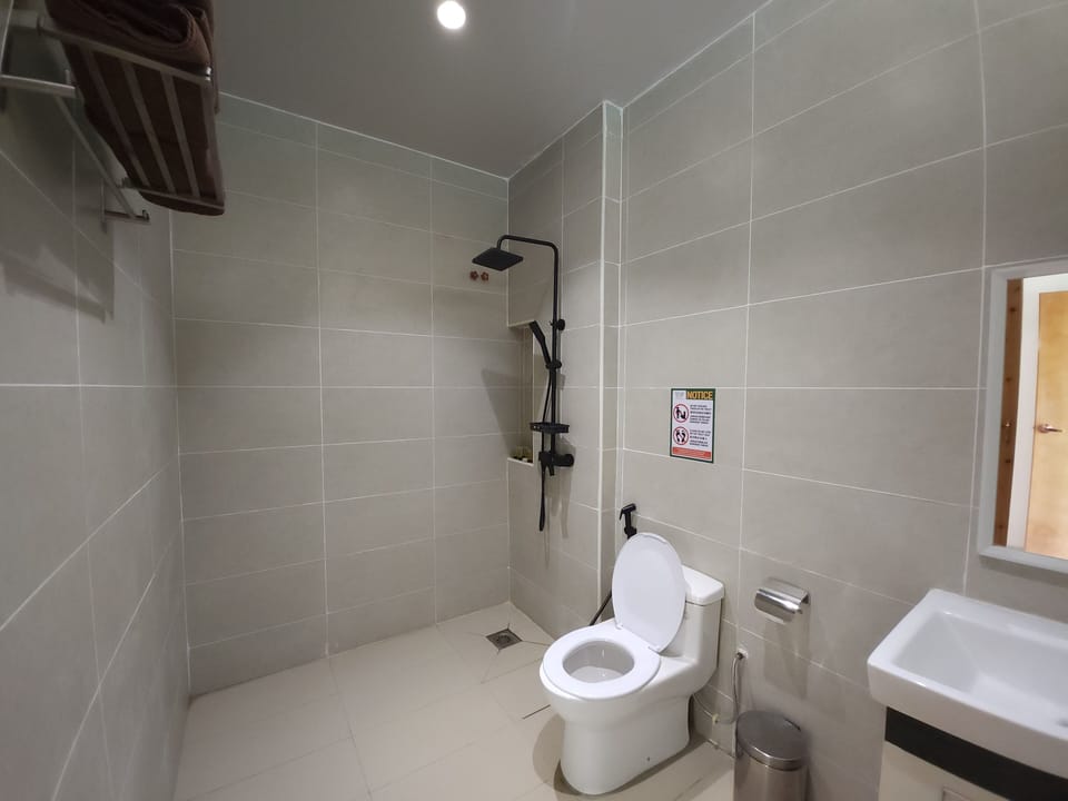 Shower, slippers, towels, soap