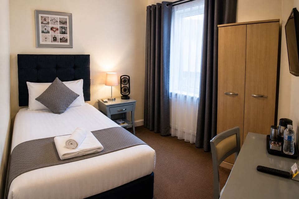 Standard Single Room | Blackout drapes, soundproofing, iron/ironing board (on request)