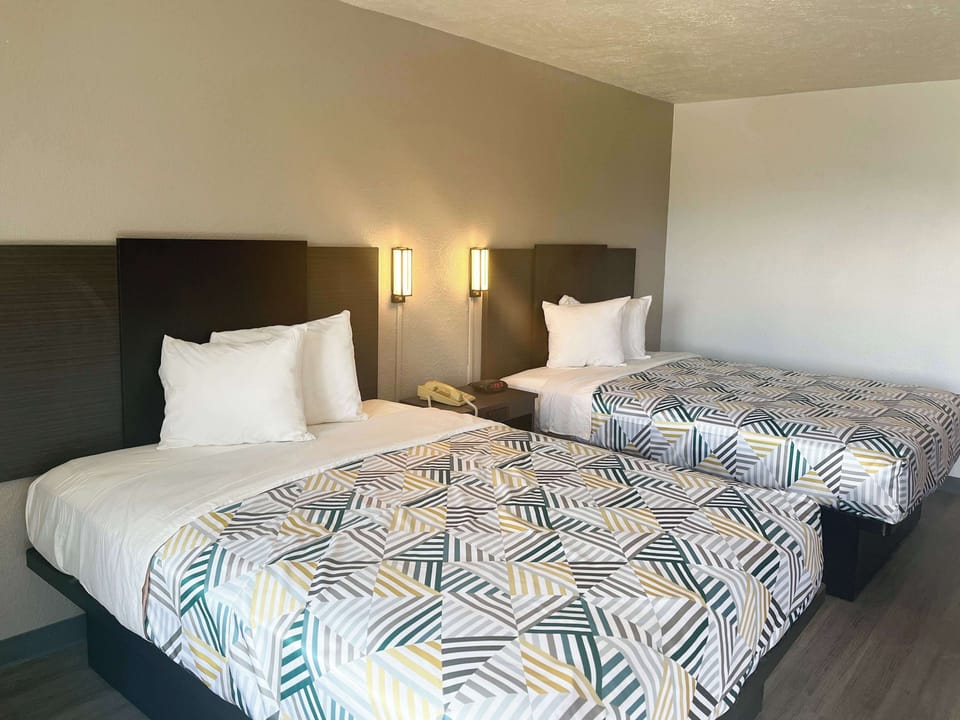 Blackout drapes, iron/ironing board, free WiFi, bed sheets