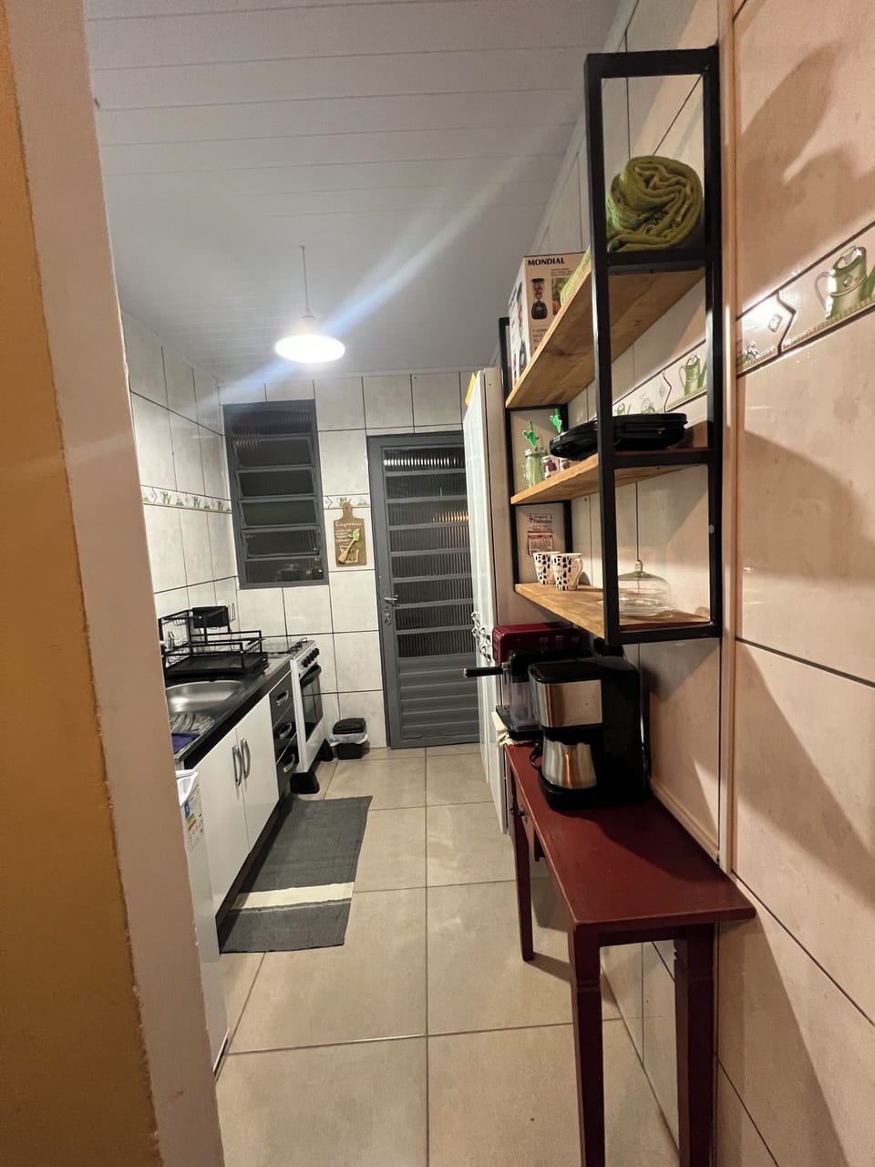 Mini-fridge, microwave, stovetop, cookware/dishes/utensils