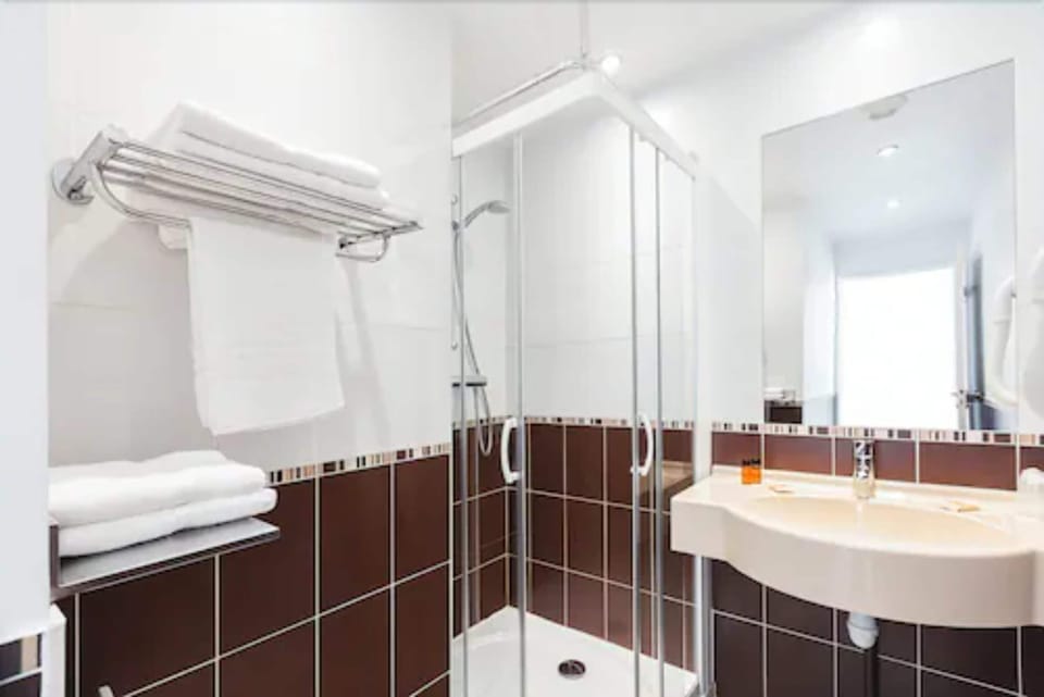 Shower, free toiletries, hair dryer, towels