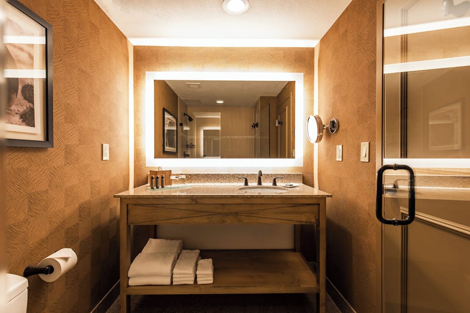 Designer toiletries, hair dryer, bathrobes, towels
