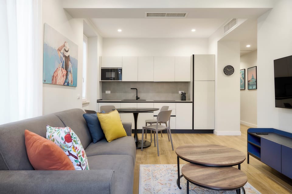 Superior Apartment, City View | Living area | Flat-screen TV