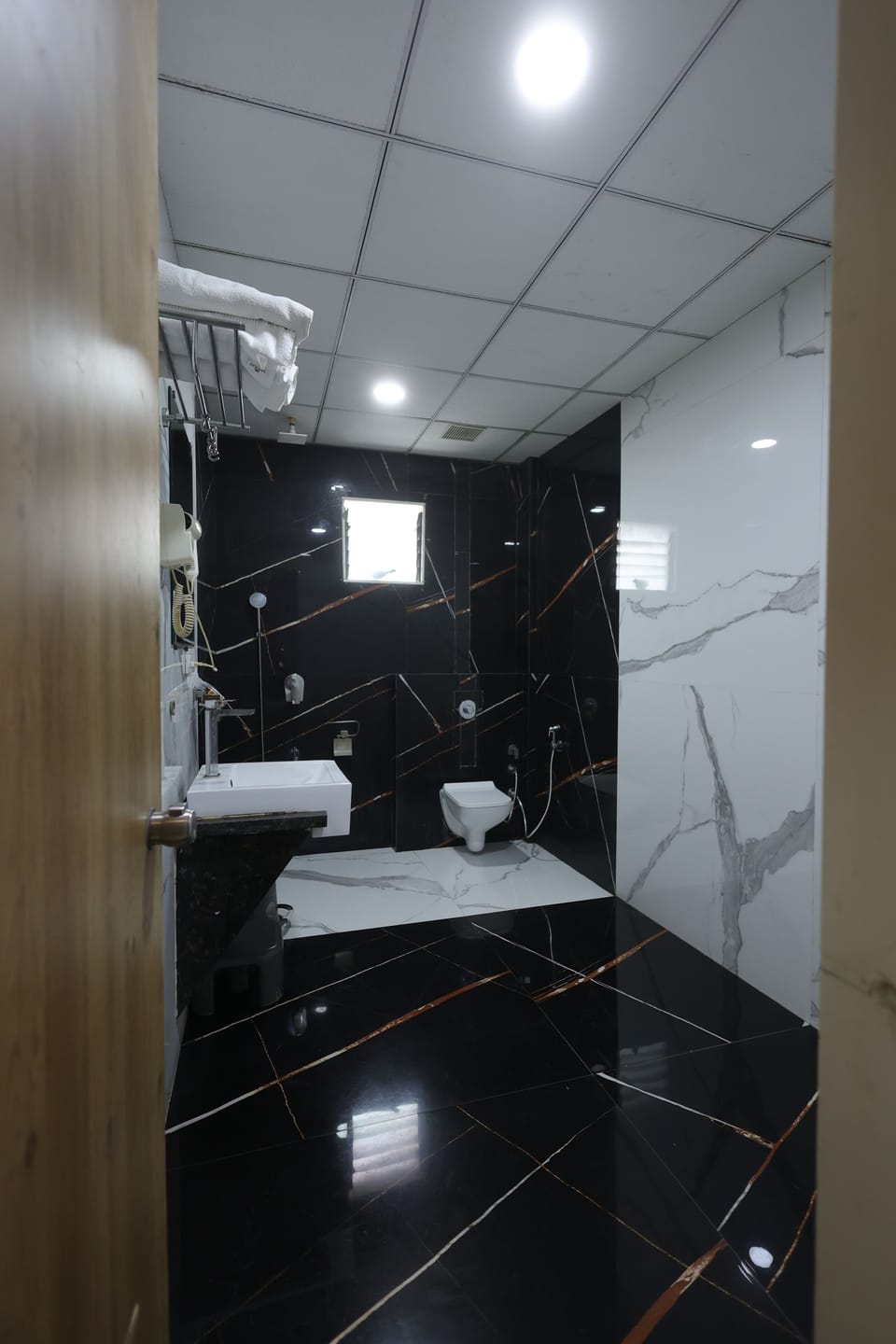 Shower, slippers, towels, soap