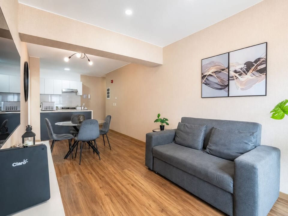 Apartment, 1 Queen Bed with Sofa bed, Refrigerator | Living area | 50-inch Smart TV with digital channels, Netflix, streaming services