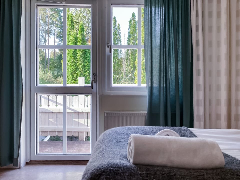 Family Quadruple Room | Desk, blackout drapes, iron/ironing board (on request)