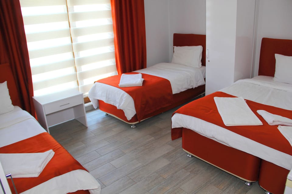 Classic Quadruple Room, City View | Iron/ironing board (on request), WiFi (free)