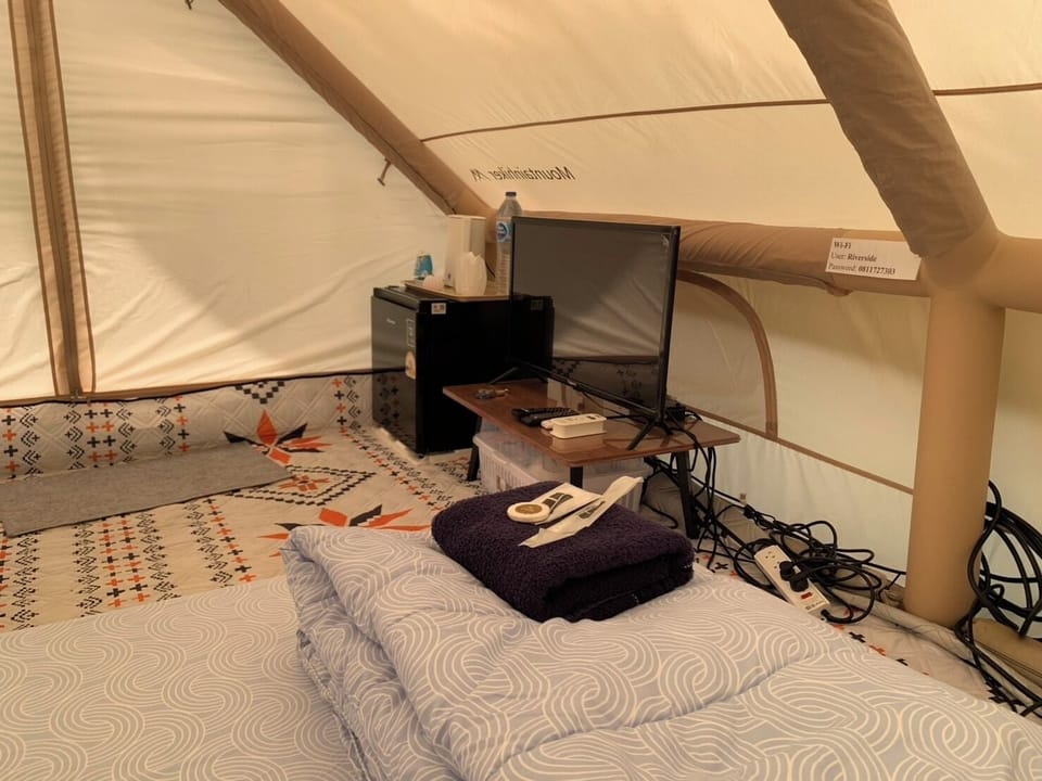 Tent, River View | Blackout drapes, iron/ironing board (on request), WiFi (free)