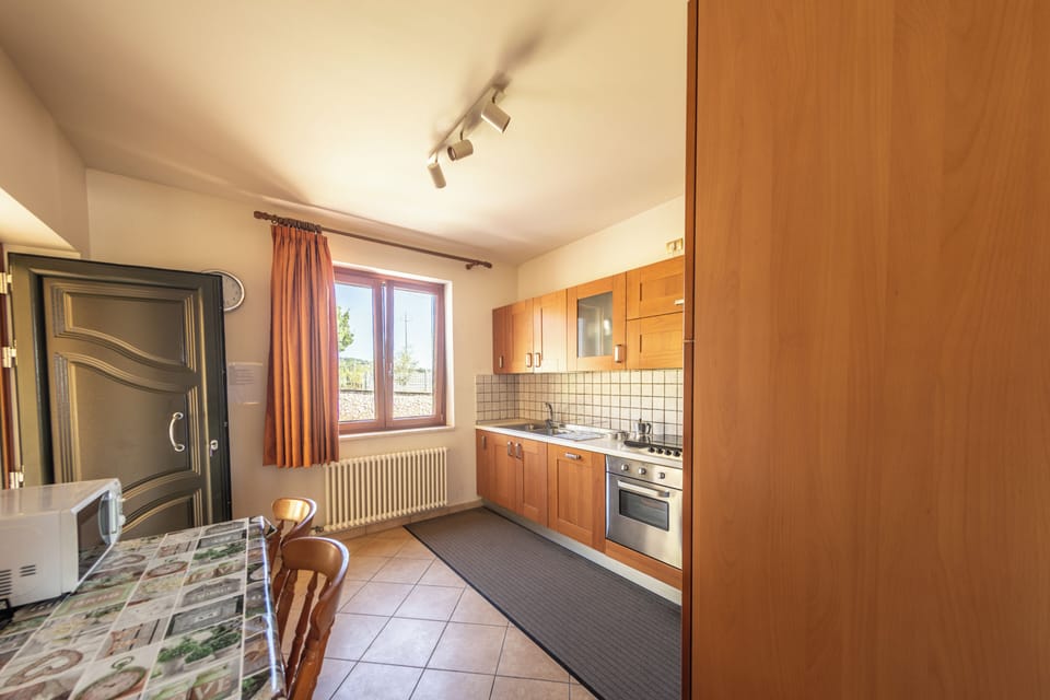 Villa, Balcony, Pool View | Private kitchen
