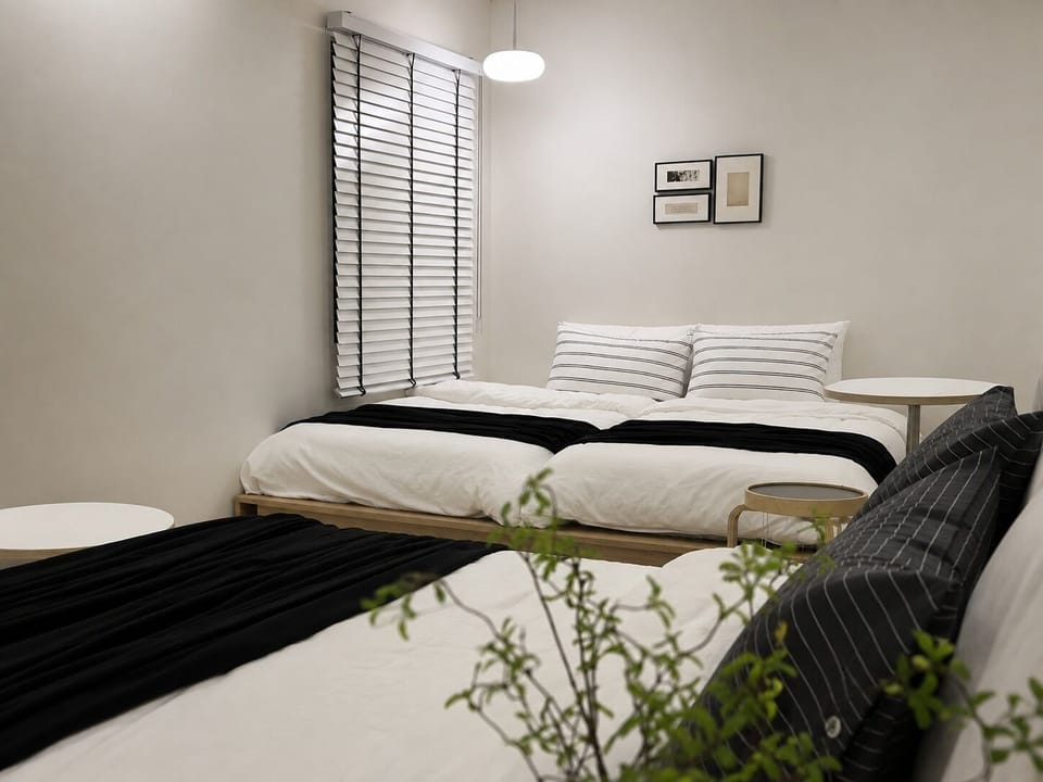 Family Triple Room | Hypo-allergenic bedding available, minibar (free items), desk