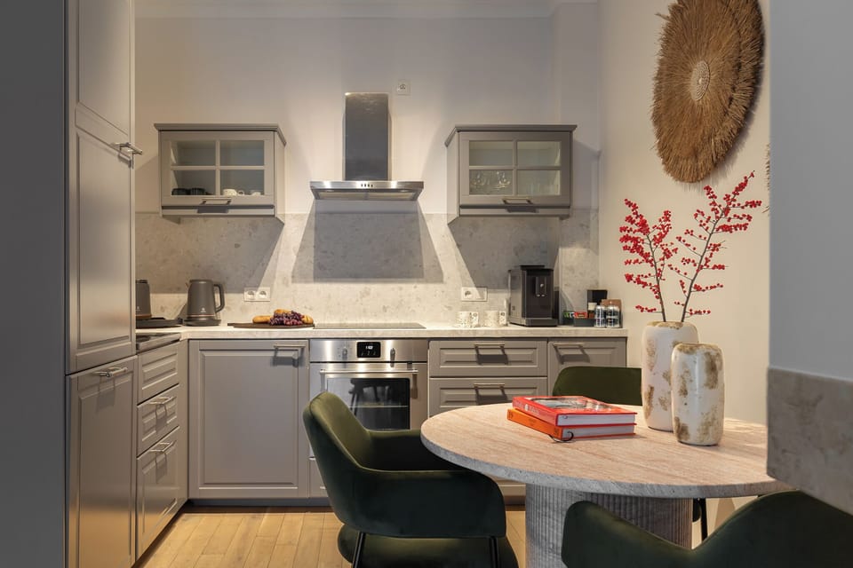 Deluxe Apartment, Park View | Private kitchenette | Espresso maker, coffee/tea maker, electric kettle, highchair