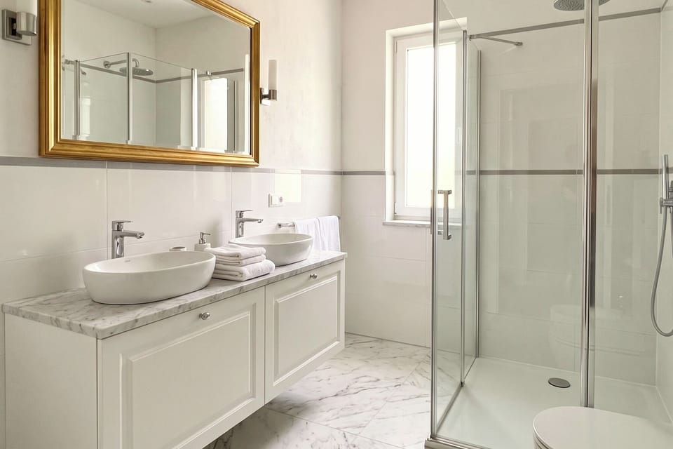 Separate tub and shower, deep soaking tub, towels