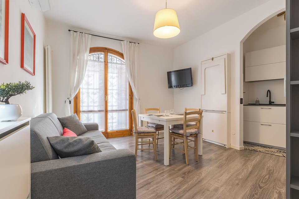 Apartment, 1 Bedroom, Balcony | Living area | 30-inch TV with satellite channels