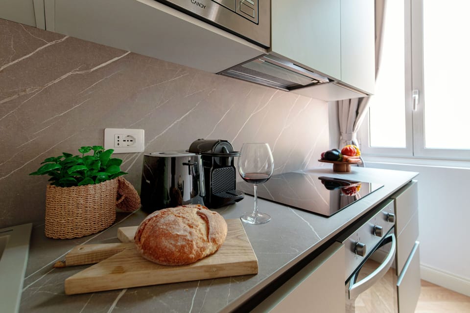 Apartment, Balcony | Private kitchen | Full-size fridge, microwave, oven, stovetop