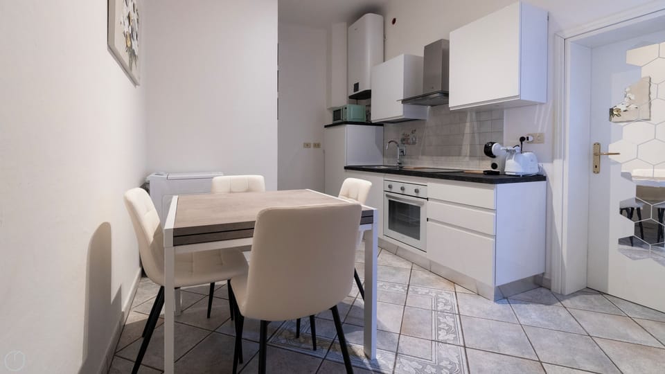 Apartment (1 Bedroom) | Living area | 32-inch Smart TV with cable channels