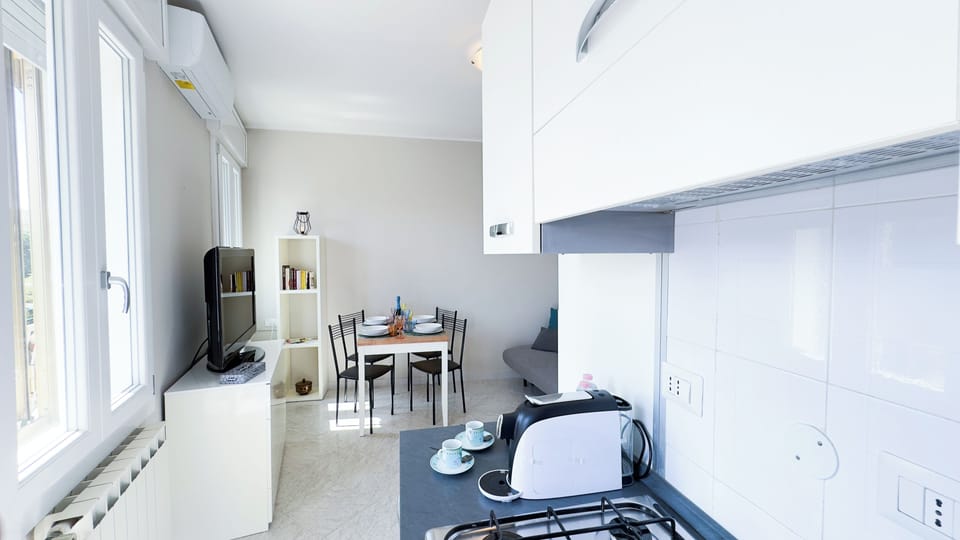 Apartment (1 Bedroom) | Living area | TV