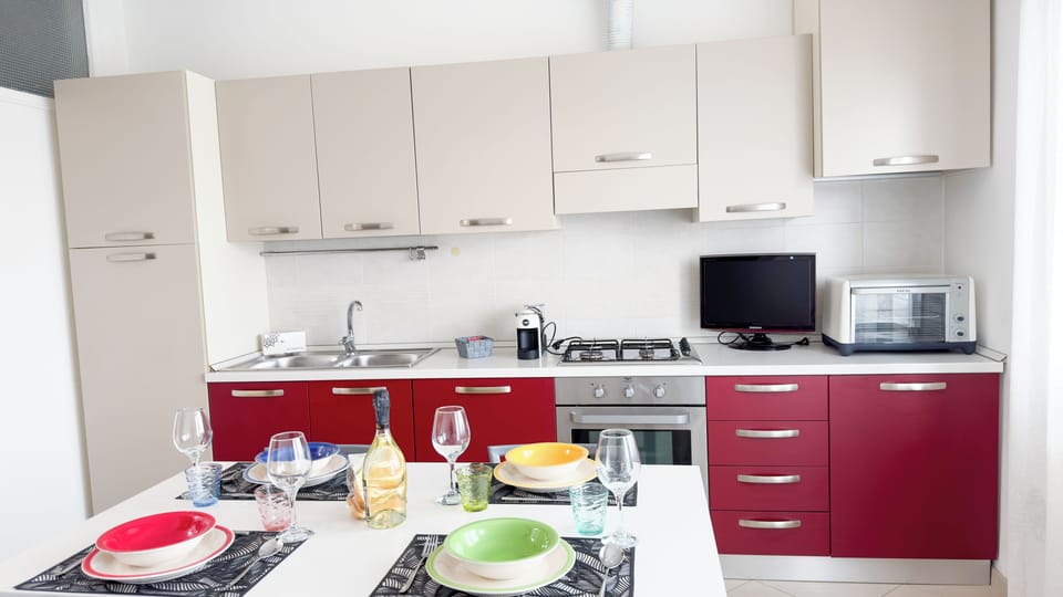 Apartment (1 Bedroom) | Private kitchenette | Espresso maker, microwave, oven, highchair