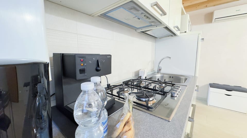 Apartment (1 Bedroom) | Private kitchen | Espresso maker, microwave, stovetop, electric kettle