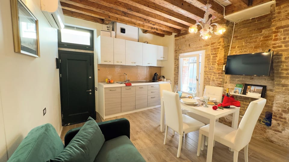 Apartment (1 Bedroom) | Living area | 32-inch TV with cable channels