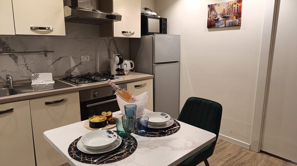 Apartment (1 Bedroom) | Private kitchenette | Espresso maker, oven, electric kettle, highchair