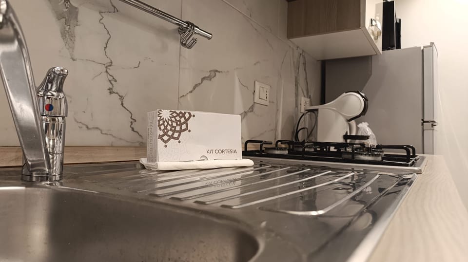 Apartment (1 Bedroom) | Private kitchenette | Espresso maker, oven, electric kettle, highchair