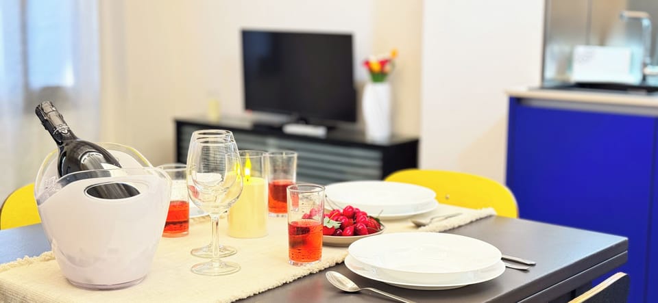 Apartment (1 Bedroom) | Living area | 32-inch Smart TV with cable channels