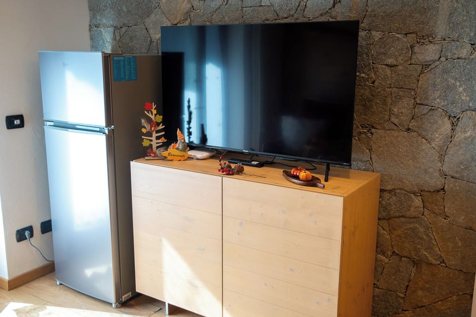 Apartment (1 Bedroom) | Living area | TV