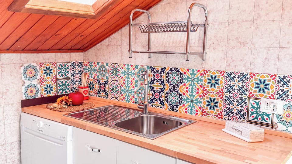 Apartment (2 Bedrooms) | Private kitchen | Stovetop, dishwasher, highchair, cookware/dishes/utensils