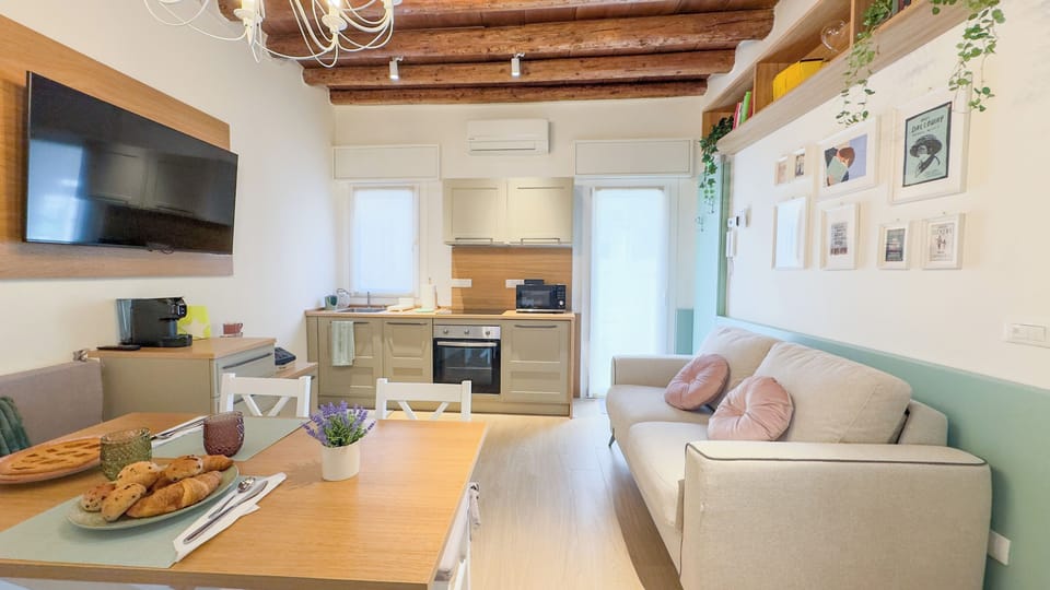 Apartment (1 Bedroom) | Living area | 32-inch plasma TV with cable channels