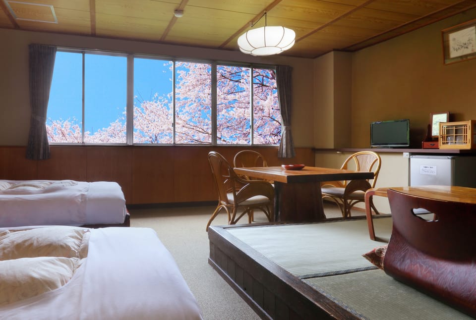 Japanese Western Room OTOMEKAN (2 Single Beds + 4 Japanese Futons), Mountain View | Desk, laptop workspace, iron/ironing board, free WiFi