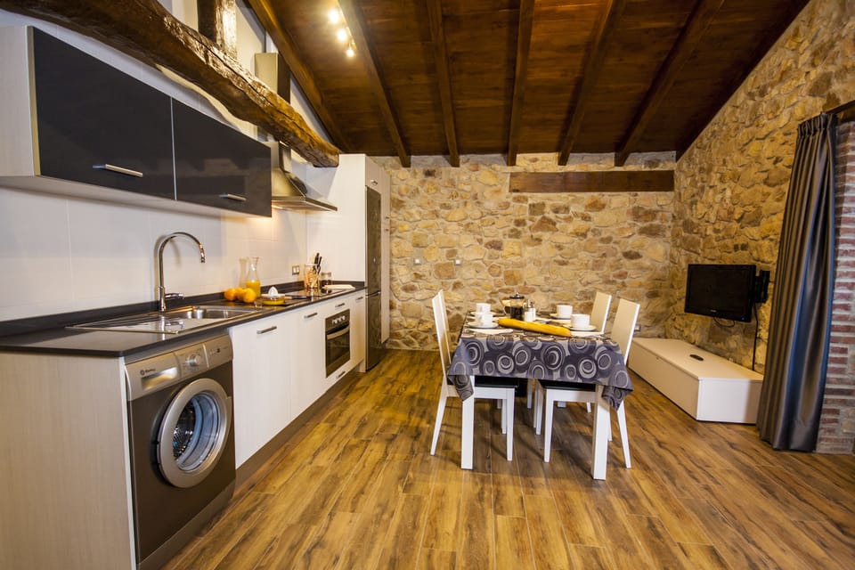 Apartment, 2 Bedrooms | Private kitchen | Full-size fridge, microwave, stovetop, coffee/tea maker