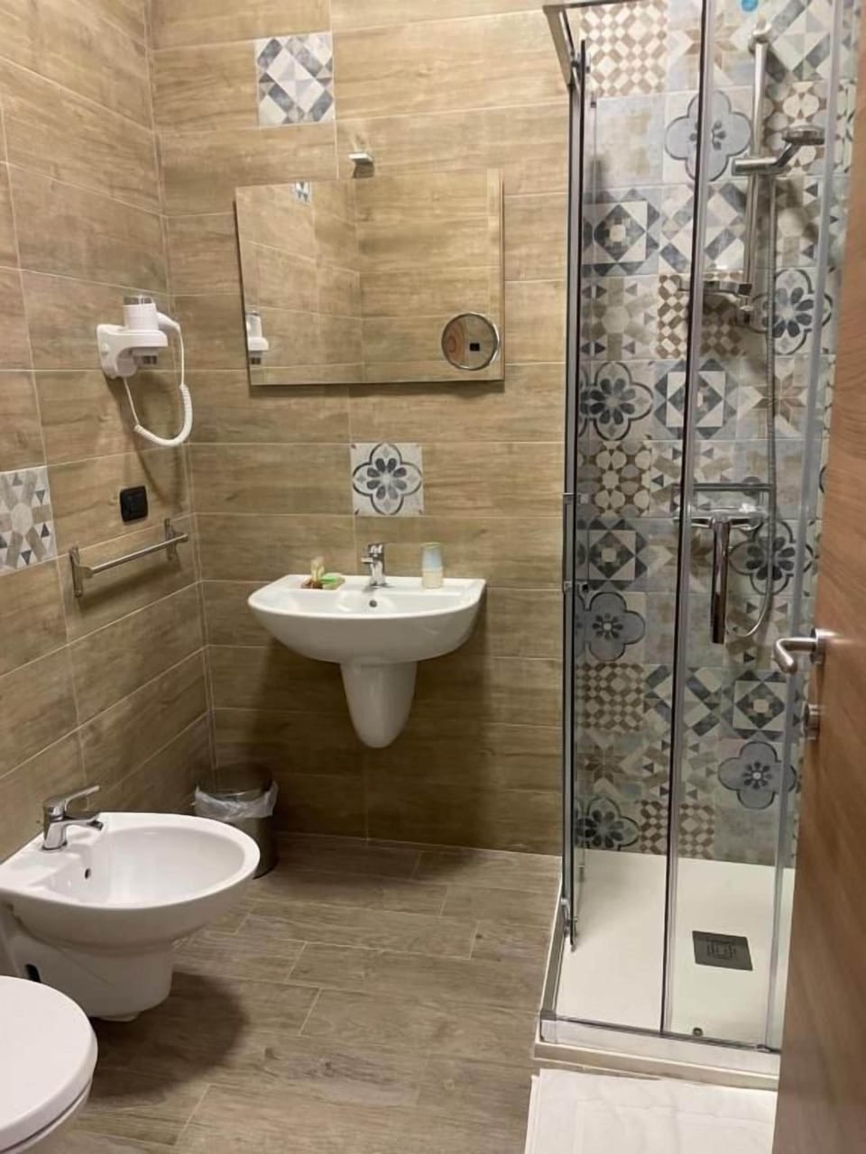 Hair dryer, towels, soap, shampoo