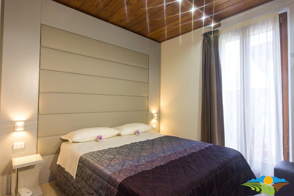 Premium bedding, free minibar items, in-room safe, desk