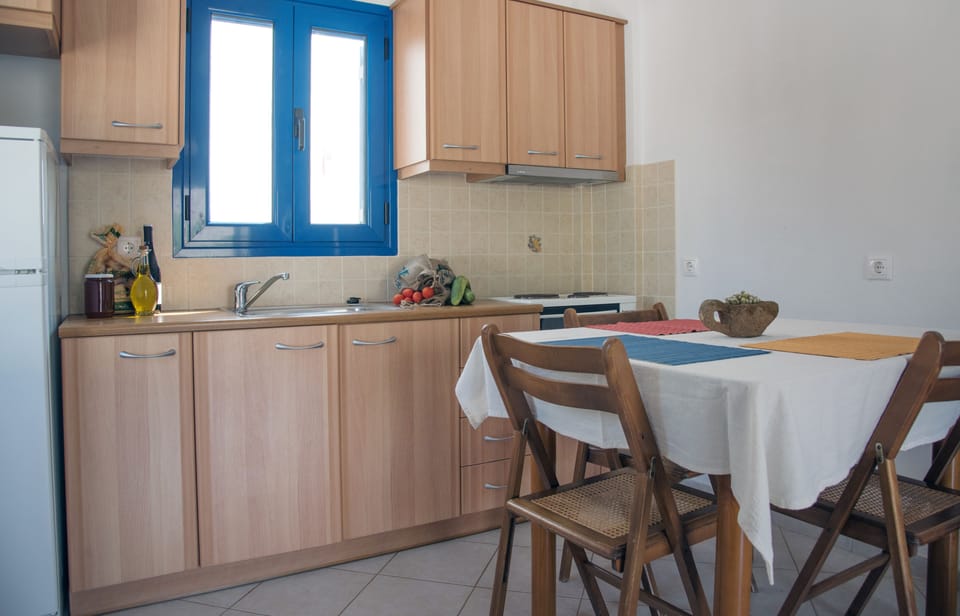 Apartment, Balcony | Private kitchen | Fridge, oven, stovetop, coffee/tea maker