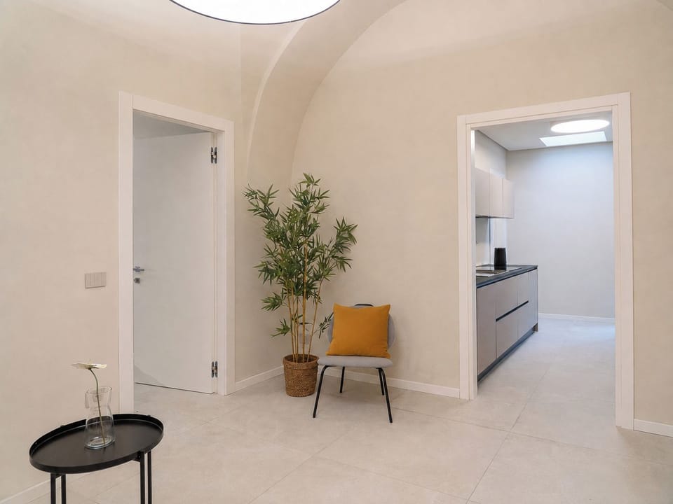 Apartment (1 Bedroom) | Living area | 32-inch TV with cable channels