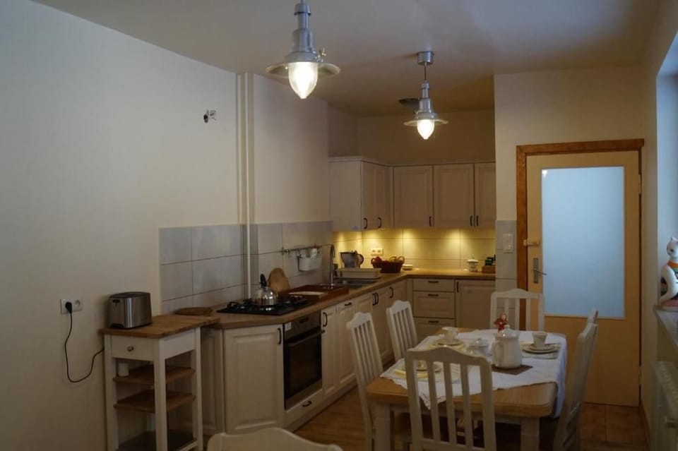 Basic Triple Room, Garden View | Private kitchen | Fridge, microwave, oven