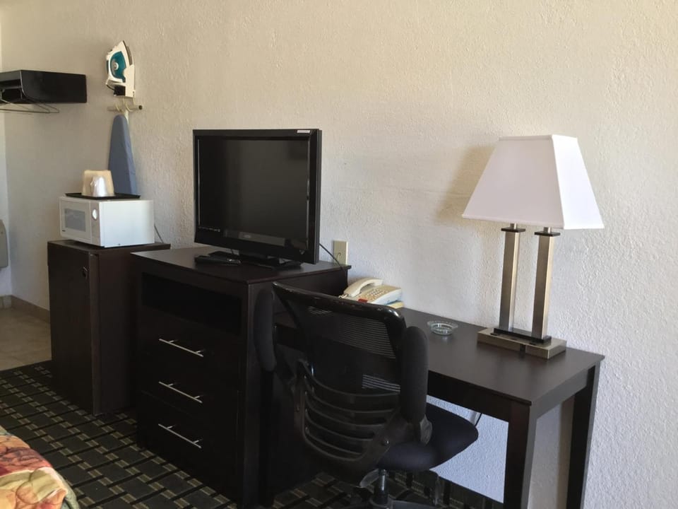 Desk, blackout drapes, iron/ironing board, WiFi (free)