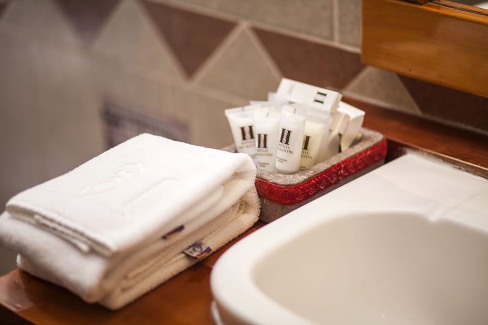 Rainfall showerhead, free toiletries, hair dryer, towels