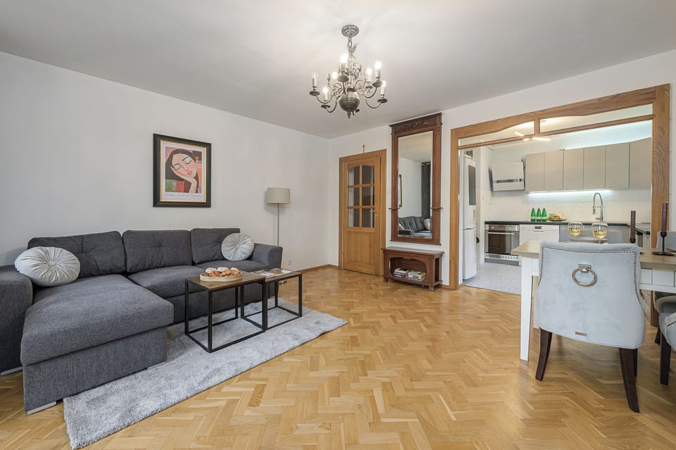 Comfort Apartment, Courtyard View | Living area | 40-inch TV with satellite channels, Netflix, streaming services