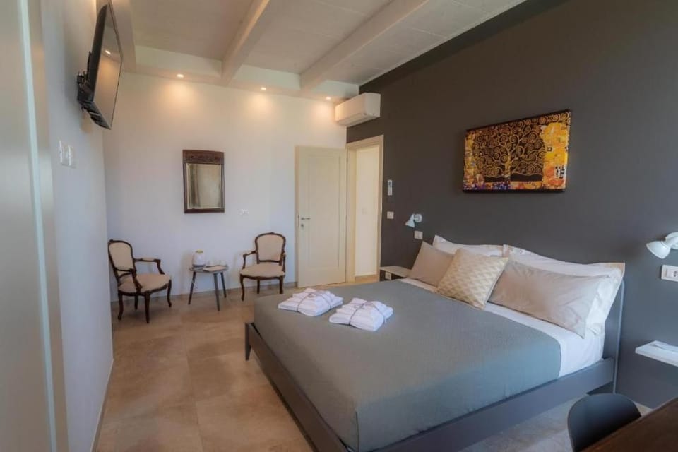 Deluxe Double Room, Pool View | In-room safe, desk, laptop workspace, blackout drapes