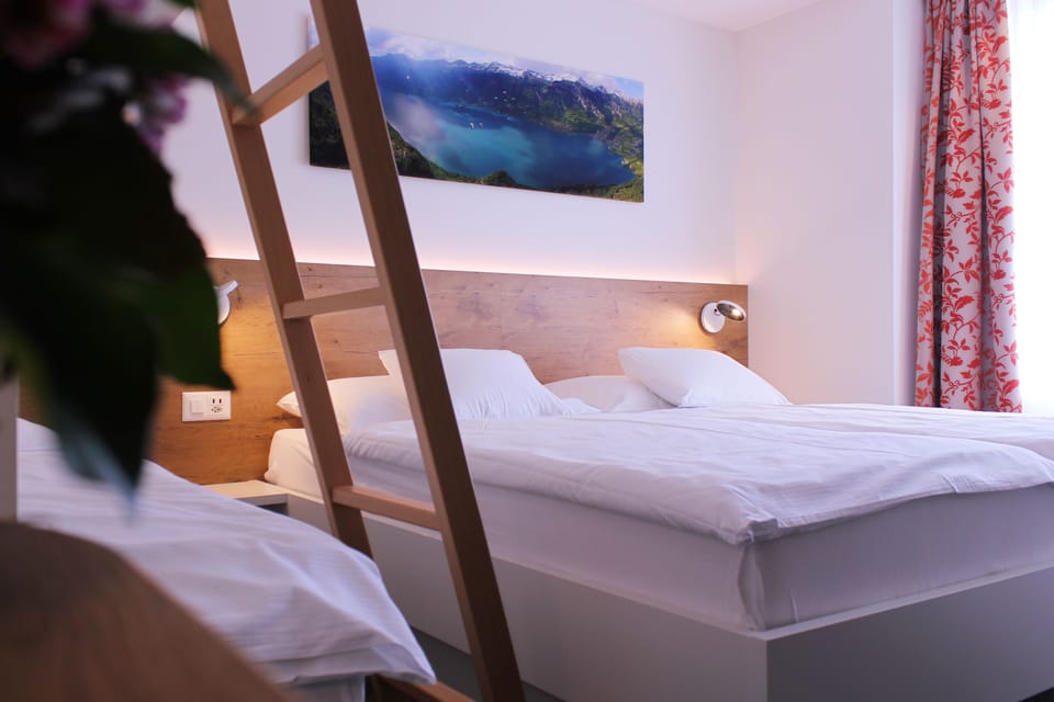 Superior Quadruple Room, Mountain View, Mountainside | Hypo-allergenic bedding, in-room safe, desk, laptop workspace