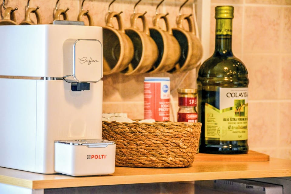 Apartment, Balcony, City View | Coffee and/or coffee maker